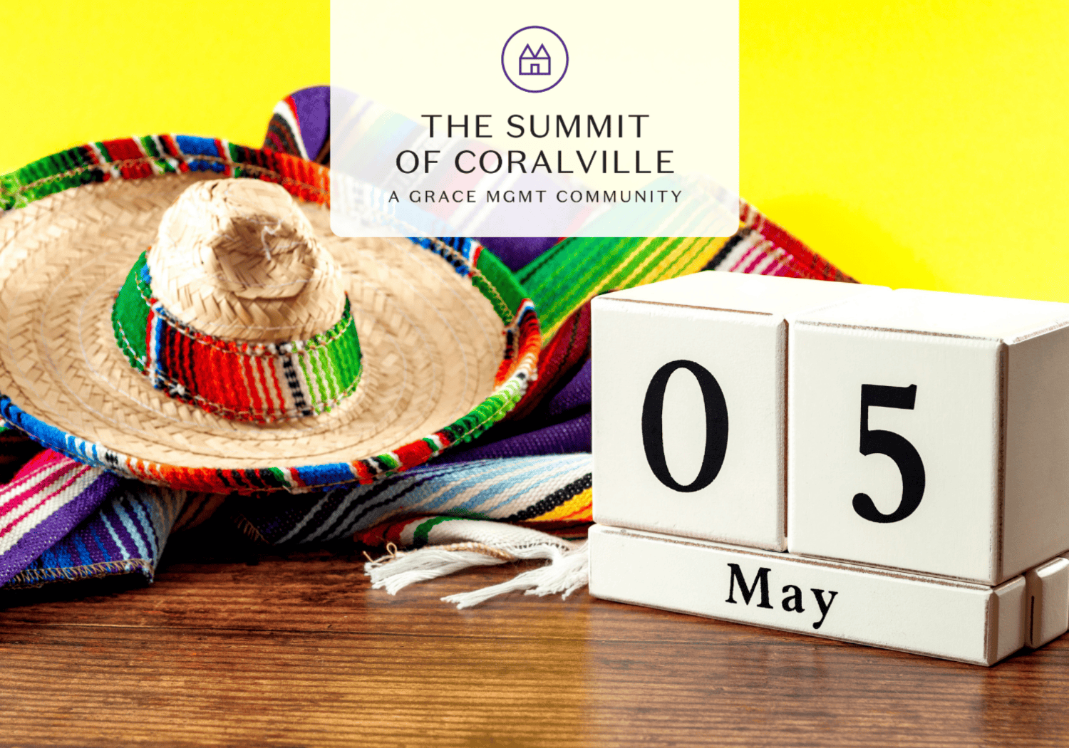 Sombrero with a colorful blanket and calendar blocks showing 05 May, promoting Cinco de Mayo at The Summit of Coralville.