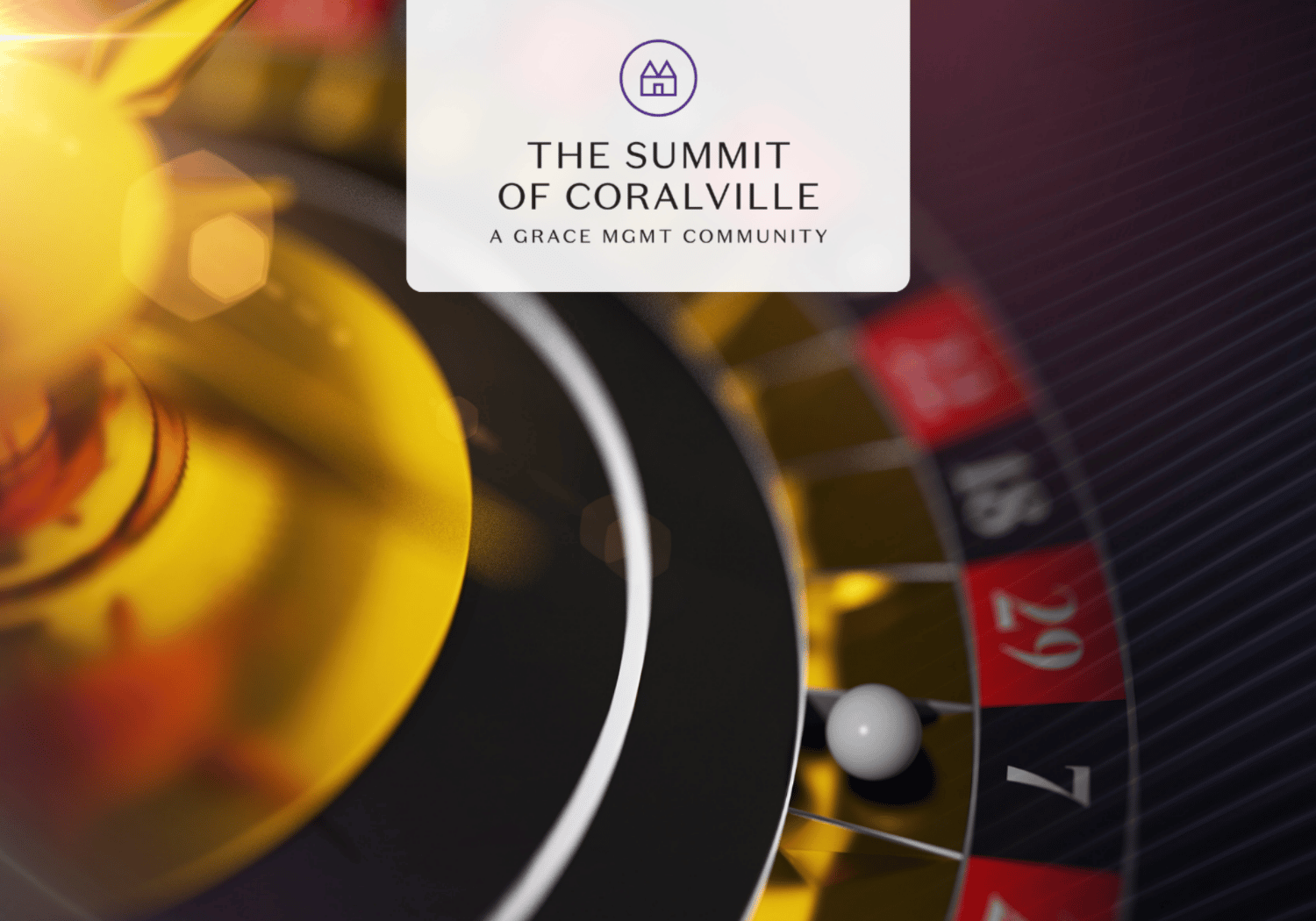 Close-up of a roulette wheel with warm yellow reflections, centered by a white rounded banner reading 'THE SUMMIT OF CORALVILLE' and 'A GRACE MGMT COMMUNITY' with a small purple circular logo above the text.